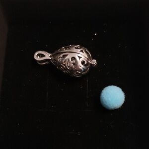 Elegant Silver Pendant with Blue Perfume Ball